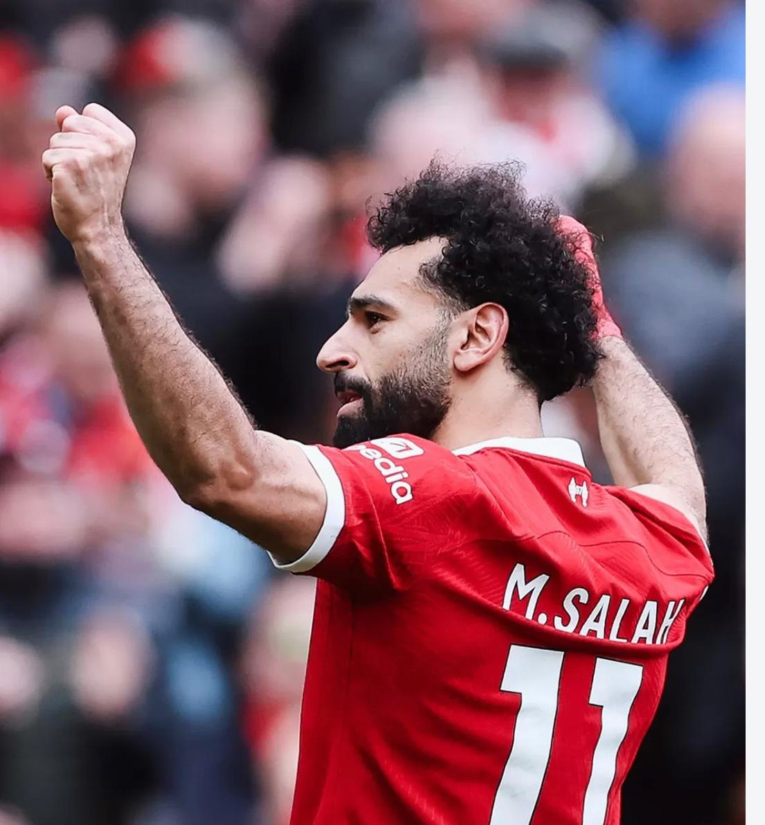 Mohamed Salah celebrating in the Liverpool kit